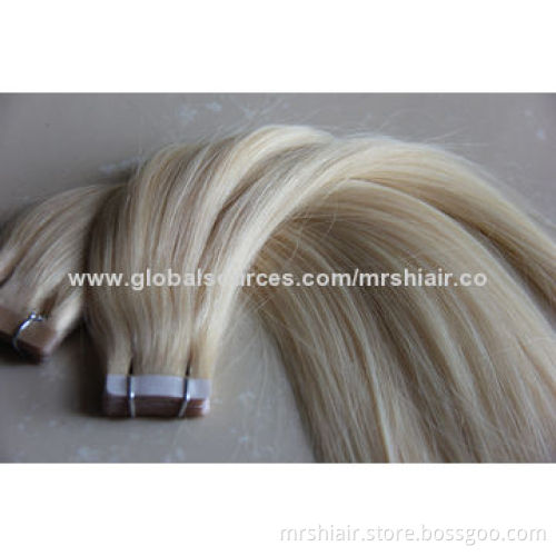 24-inch pale color Malaysian straight tape in hair